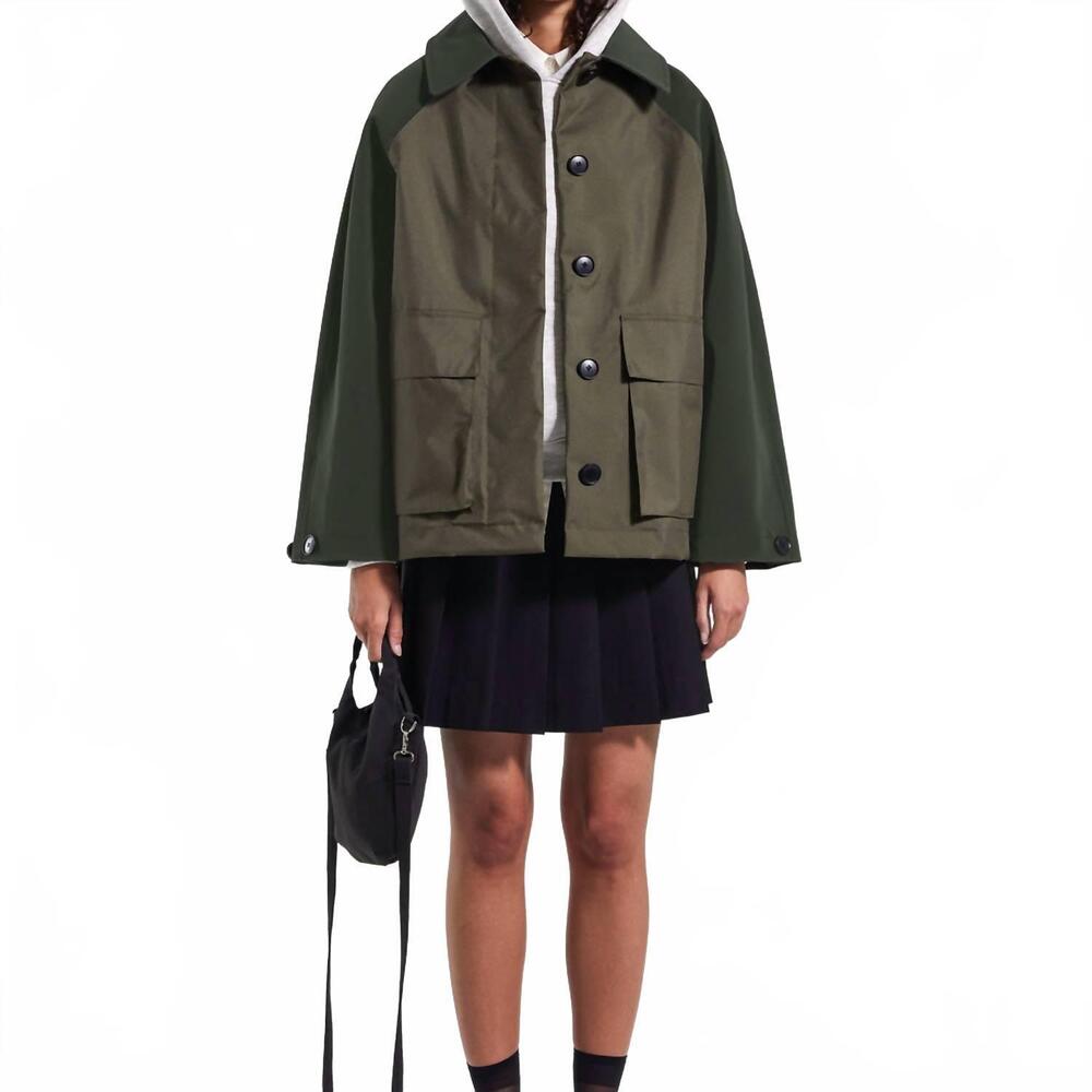 NEW STUTTERHEIM bandhagen patch raincoat in brown